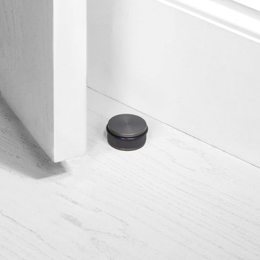 DOOR STOP / FLOOR / SMOKED BRONZE